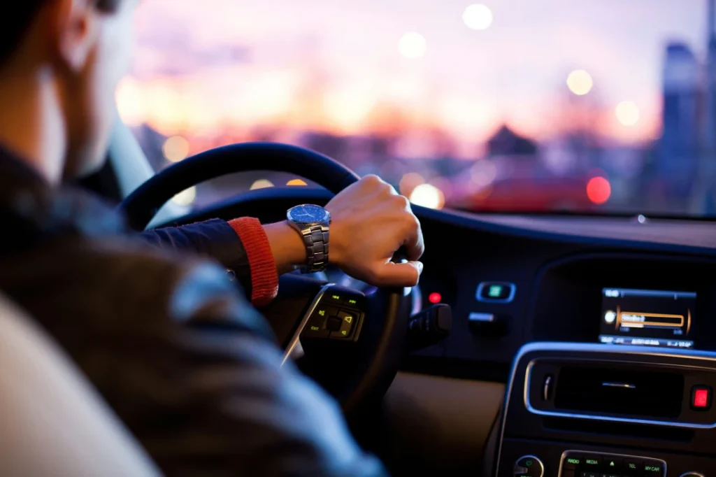 a man driving a car